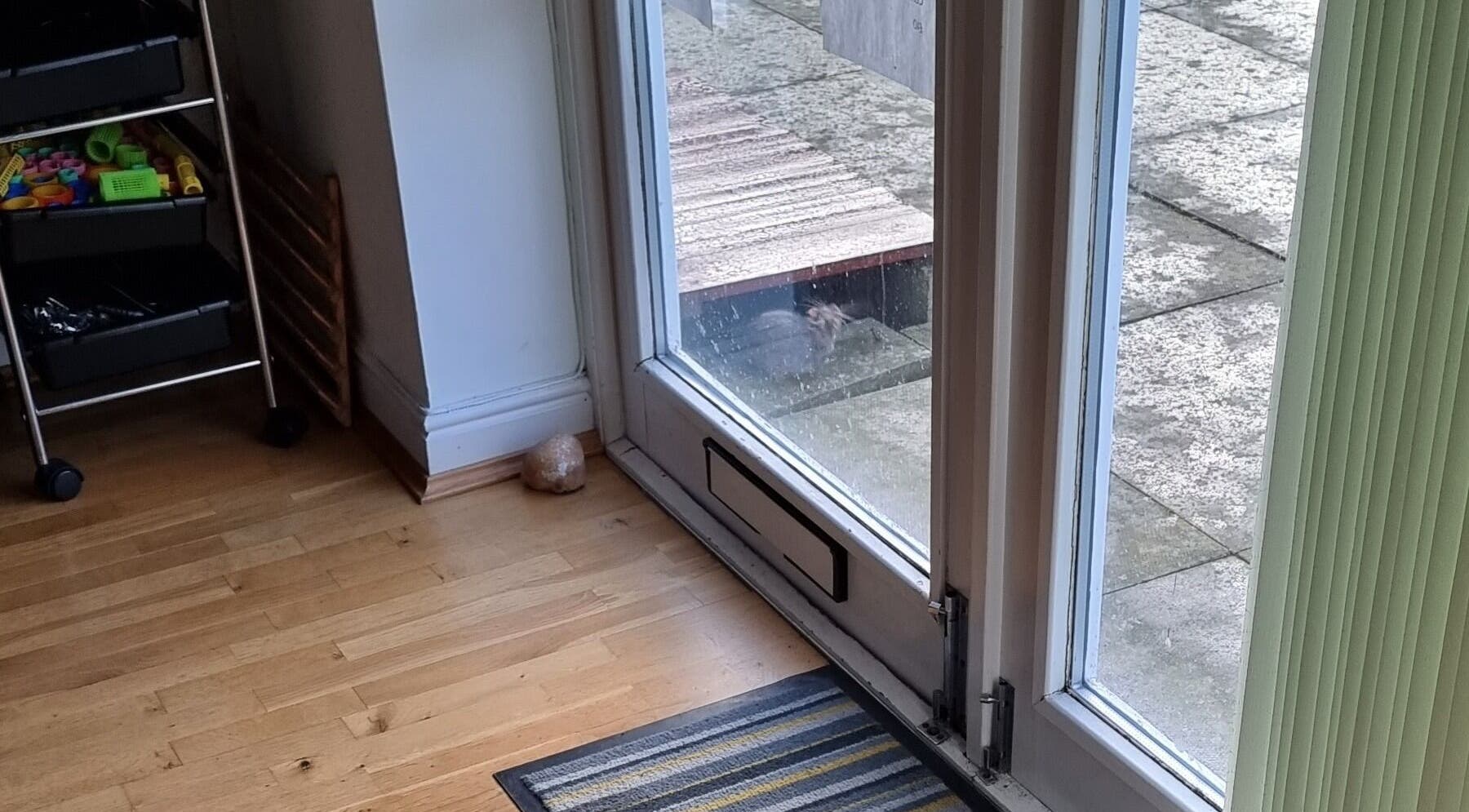 Inviting entryway at Hairbysaven#Savenwest, Ipswich, England, GB showcasing a modern glass door.