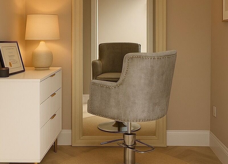 Elegant styling chair and mirror at Lauren Wellbeloved Hair in Orpington, England, GB reflecting calm ambiance.