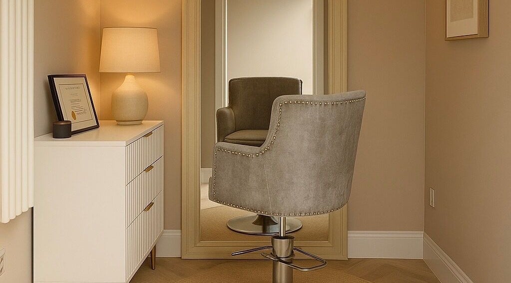 Elegant hair salon chair and mirror at Lauren Wellbeloved Hair, Orpington, England, GB.