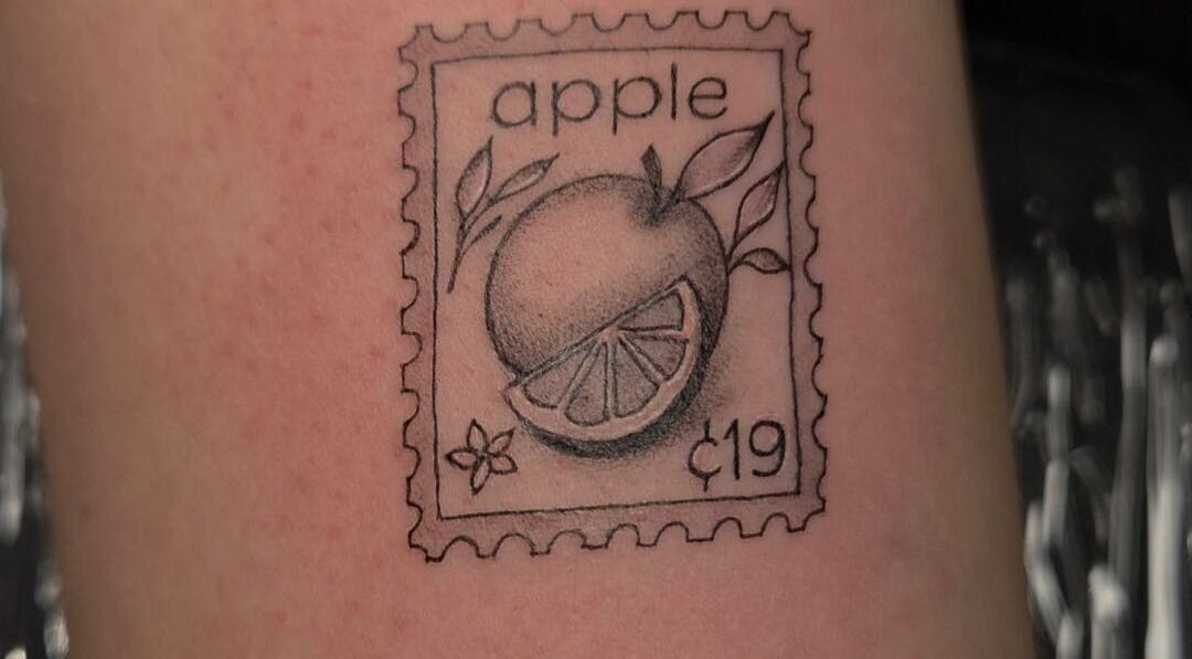 Detailed apple tattoo design at Lumie Aure Beauty Studio, Ottawa, Ontario, CA.