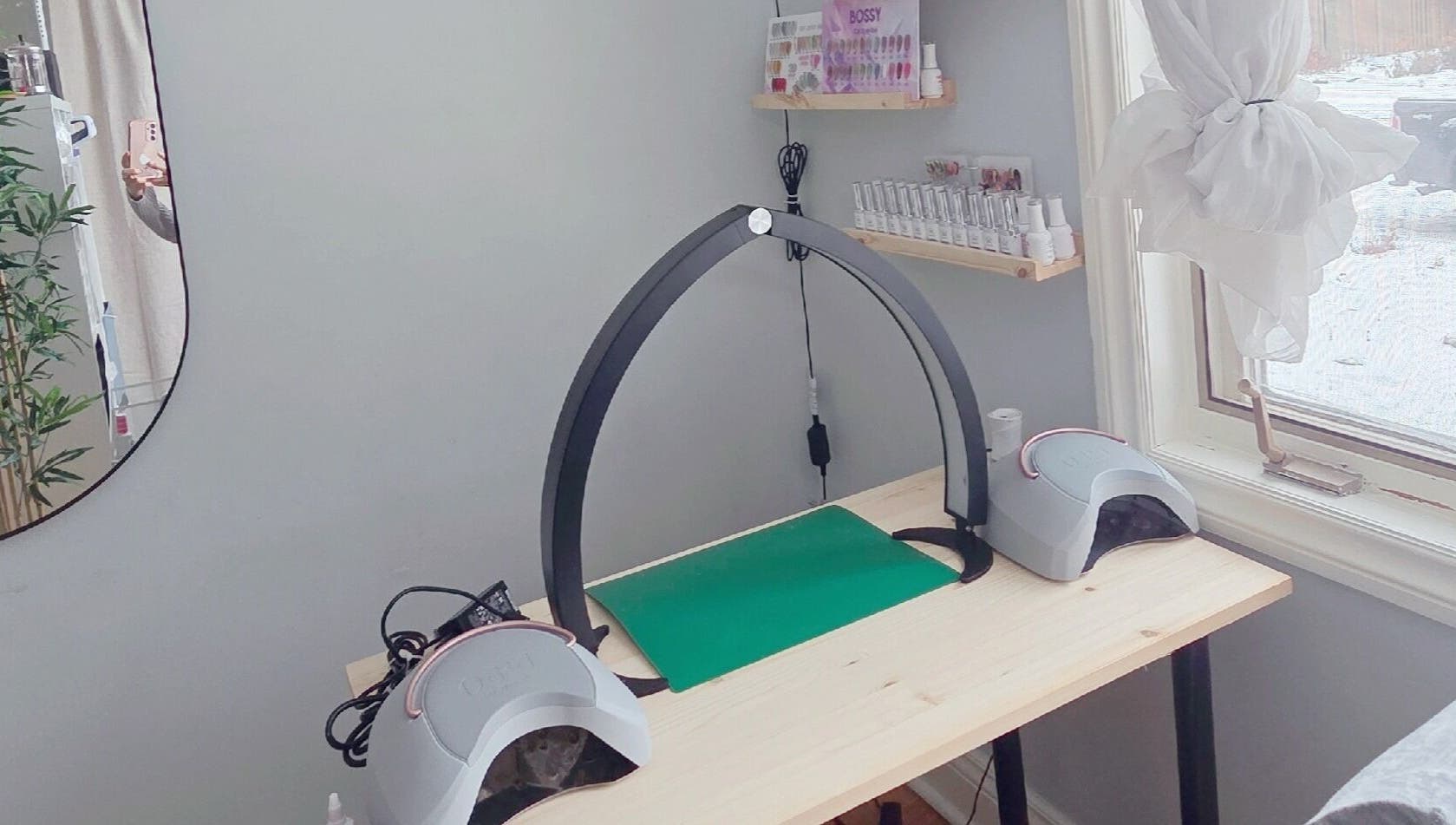 Nail station at Lumie Aure Beauty Studio in Ottawa, Ontario, CA, featuring modern equipment and natural light.