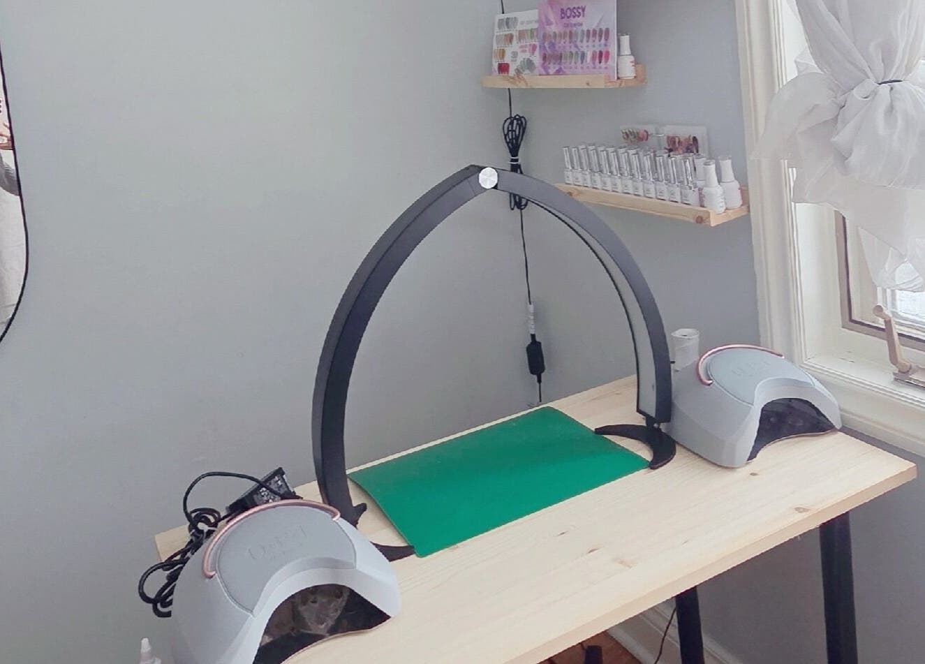 Nail station at Lumie Aure Beauty Studio in Ottawa, Ontario, CA, featuring modern equipment and natural light.