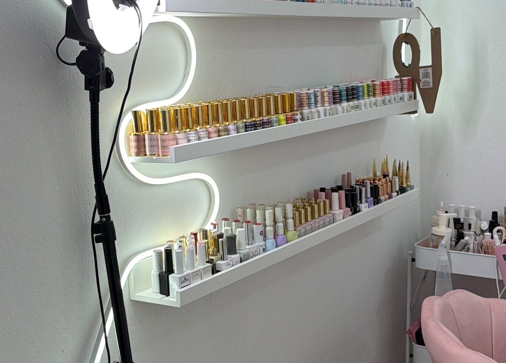 Nail polish shelves at Nails by rossy in Santiago De Los Caballeros, Santiago, DO.