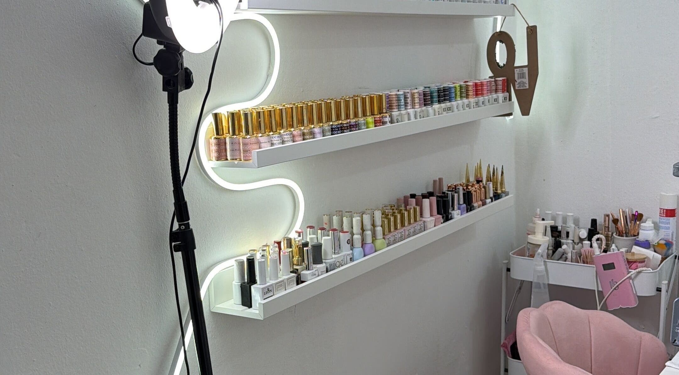 Nail polish shelves at Nails by rossy in Santiago De Los Caballeros, Santiago, DO.