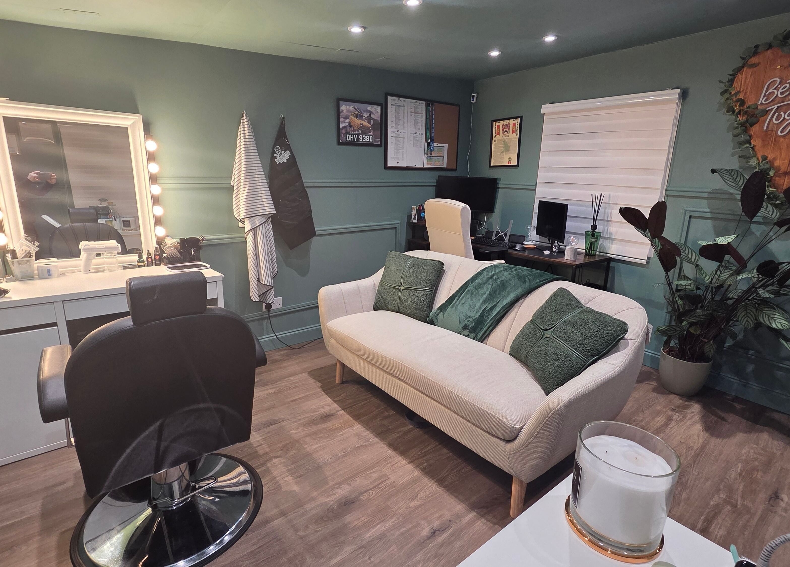 Stylish interior of The Green Room Barbers in Leeds, England, GB with modern decor and comfortable seating.