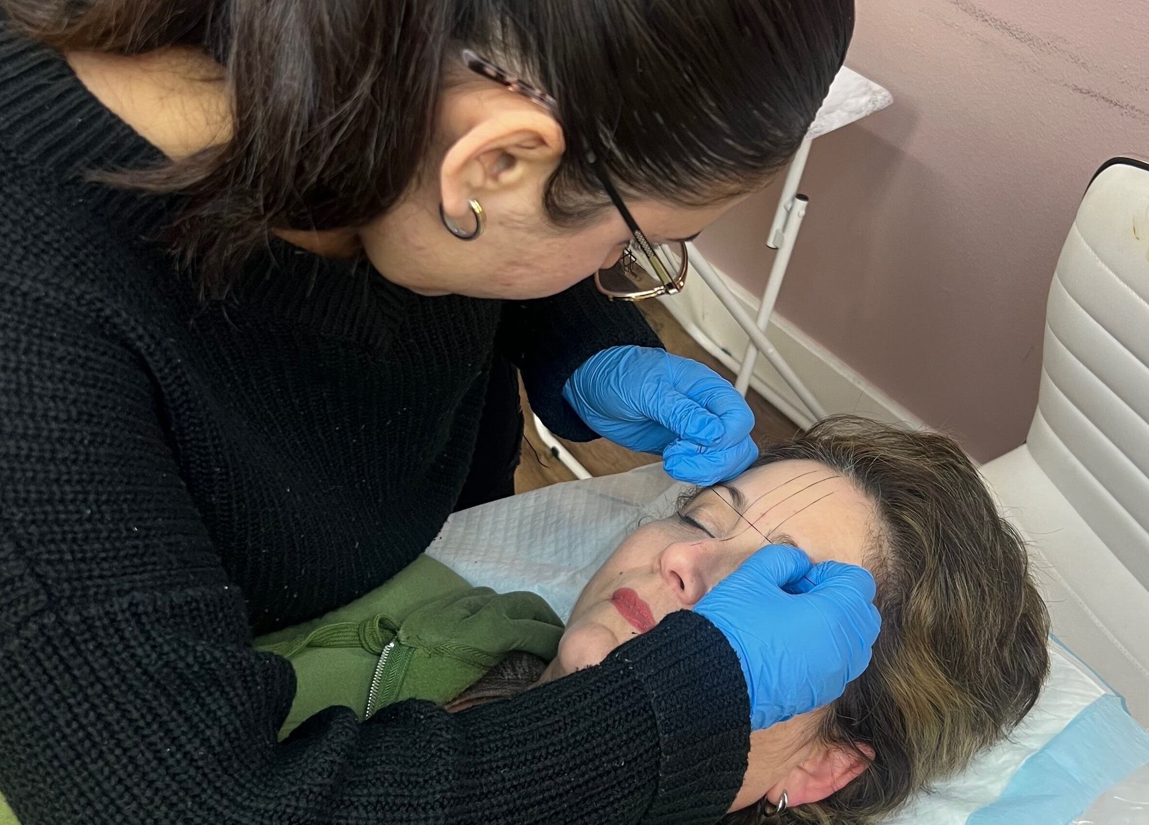 Professional threading service at Lorilane’s Cosmetics, Westlake Village, California, US.