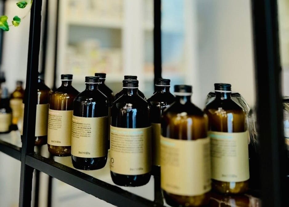 Organic products displayed at Miss Organic Salon, Prahran, Victoria, AU, showcasing premium beauty bottles.