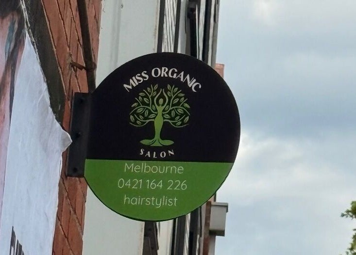 Miss Organic Salon sign in Prahran, Victoria, AU with contact info and tree logo.