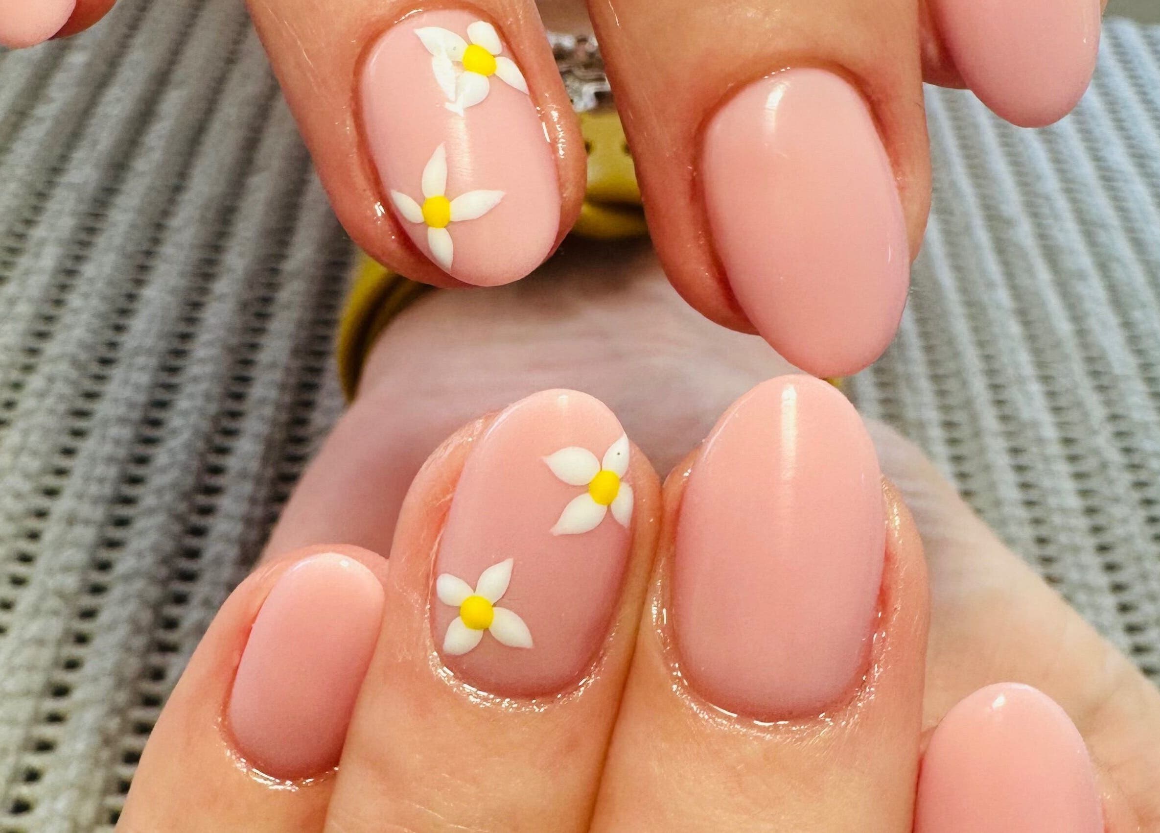 Floral nail art in pale pink at Lux-glomournails, Cape Town, Western Cape, ZA.
