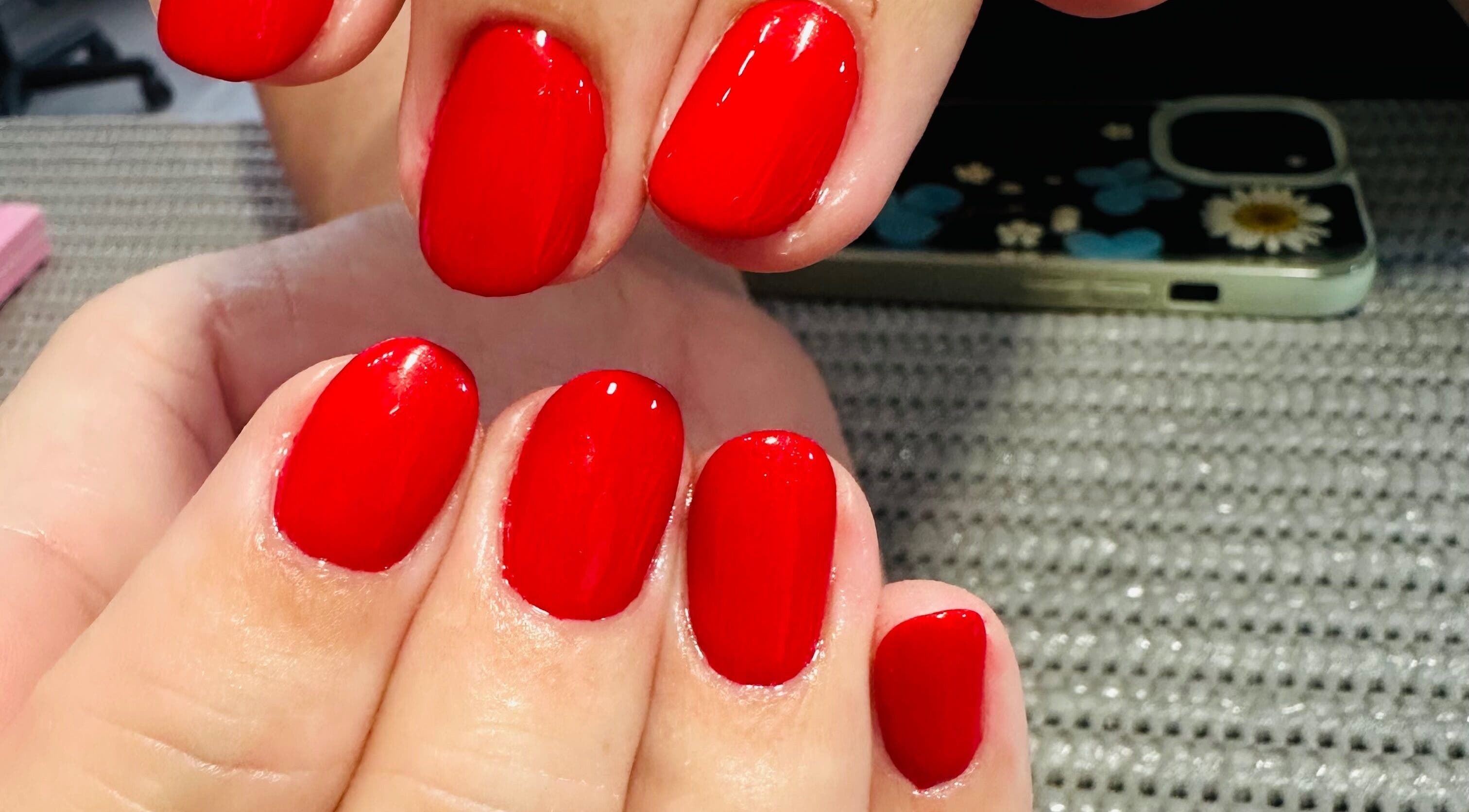Lux-glomournails showcases vibrant crimson nails in Cape Town, Western Cape, ZA, perfect for a standout look.