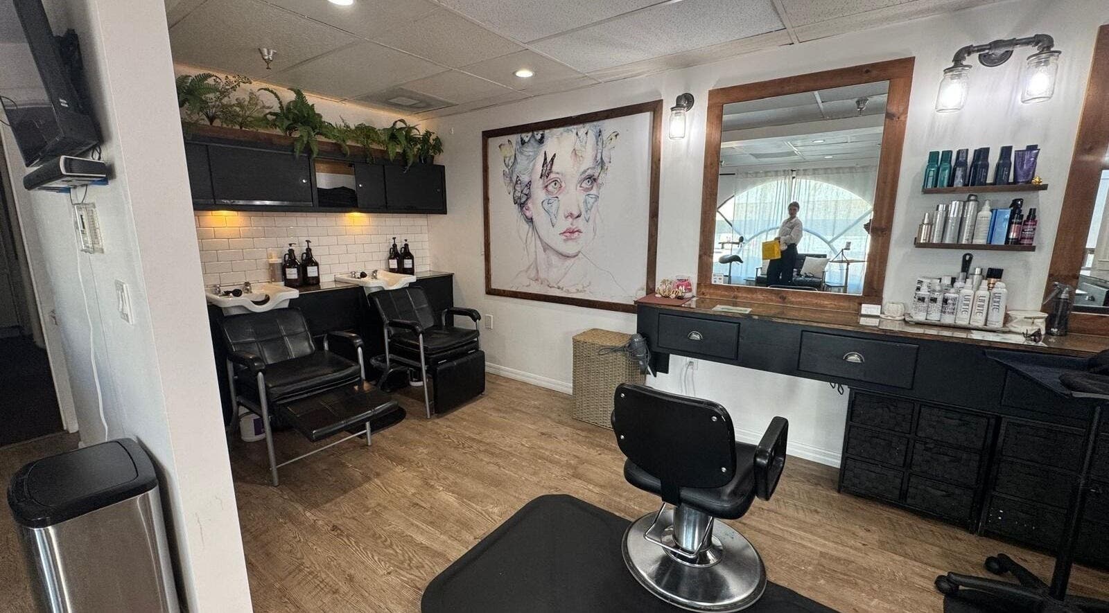 Modern salon interior at Roxana Shine, Los Angeles, California, US, featuring elegant styling stations.