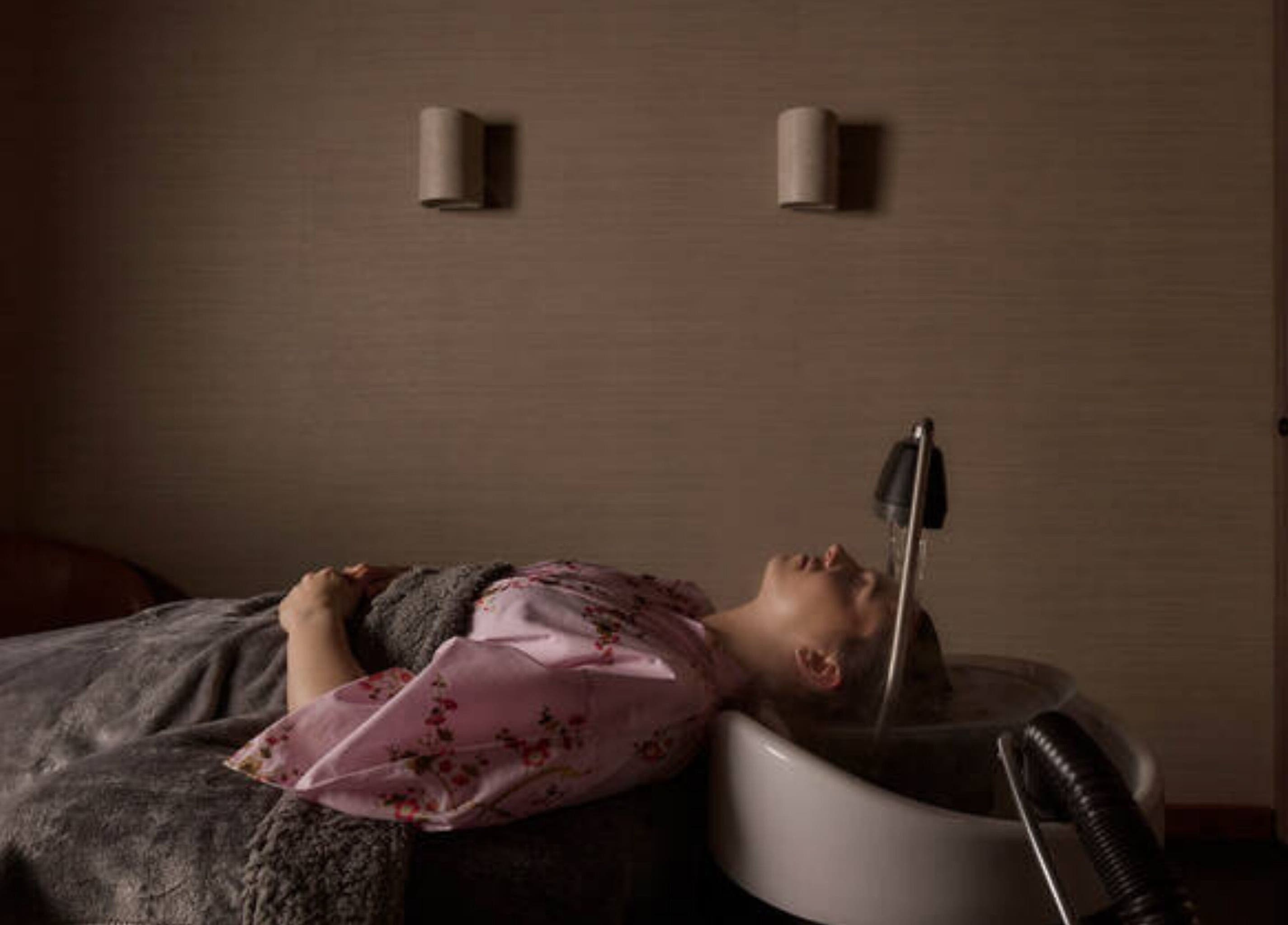 Relaxing head spa at Tokyo Headspa, St Leonards, New South Wales, AU. Experience tranquility and rejuvenation.