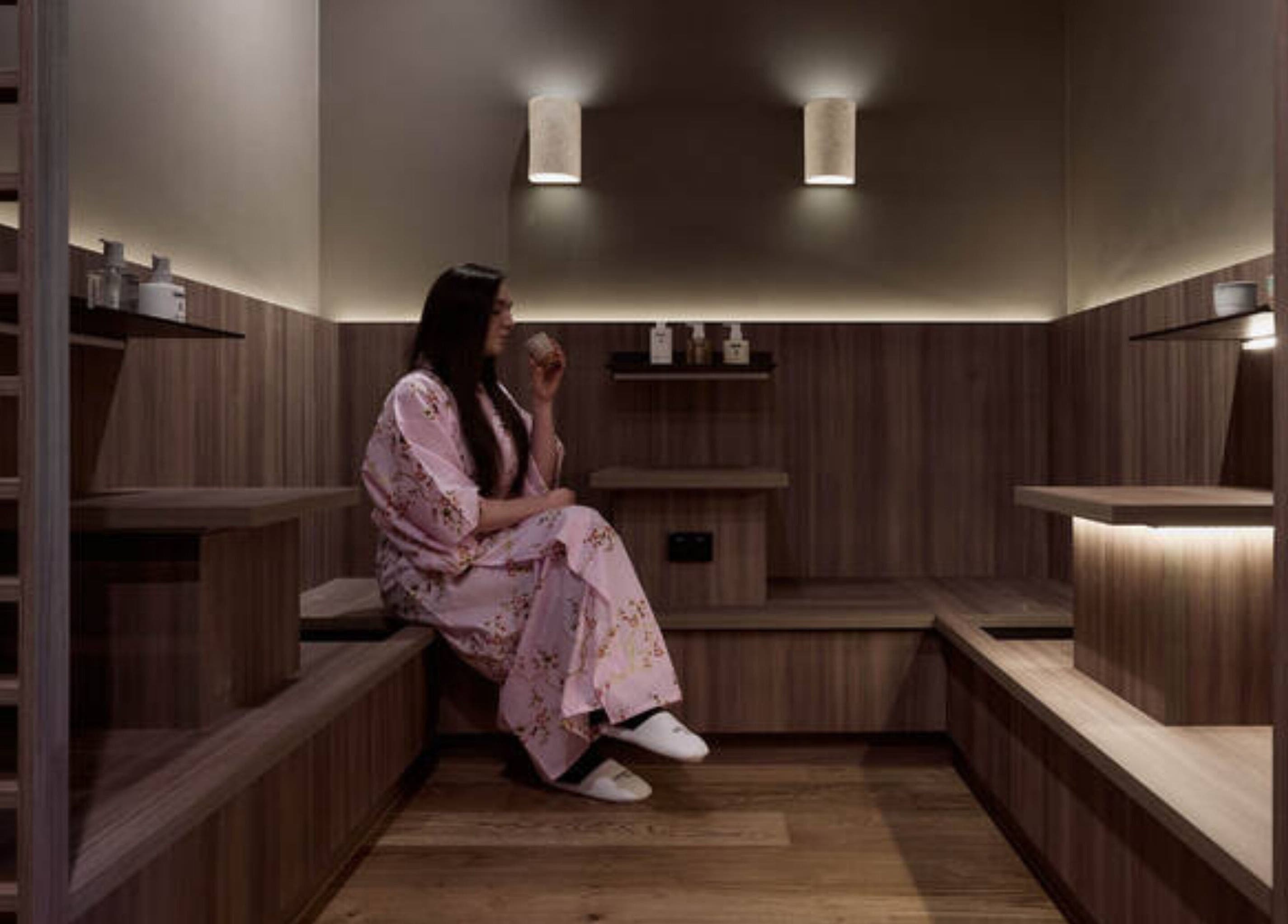 Serene woman in kimono at Tokyo Headspa, St Leonards, New South Wales, AU enjoying a calming moment.