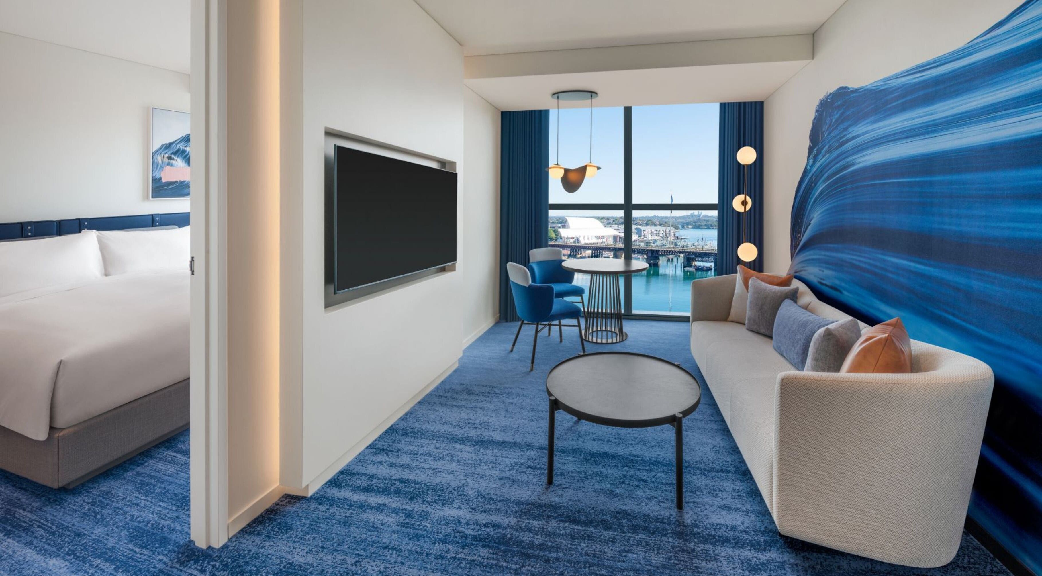 Stylish suite at In-Room - W Hotel with harbor view, Sydney, New South Wales, AU. Elegant decor and modern amenities.