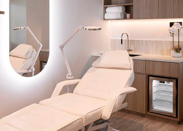 Relaxing spa treatment room at Salon Lane, St Leonards, New South Wales, AU with a modern treatment bed.