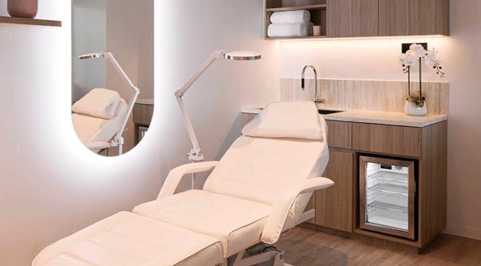 Relaxing spa treatment room at Salon Lane, St Leonards, New South Wales, AU with a modern treatment bed.