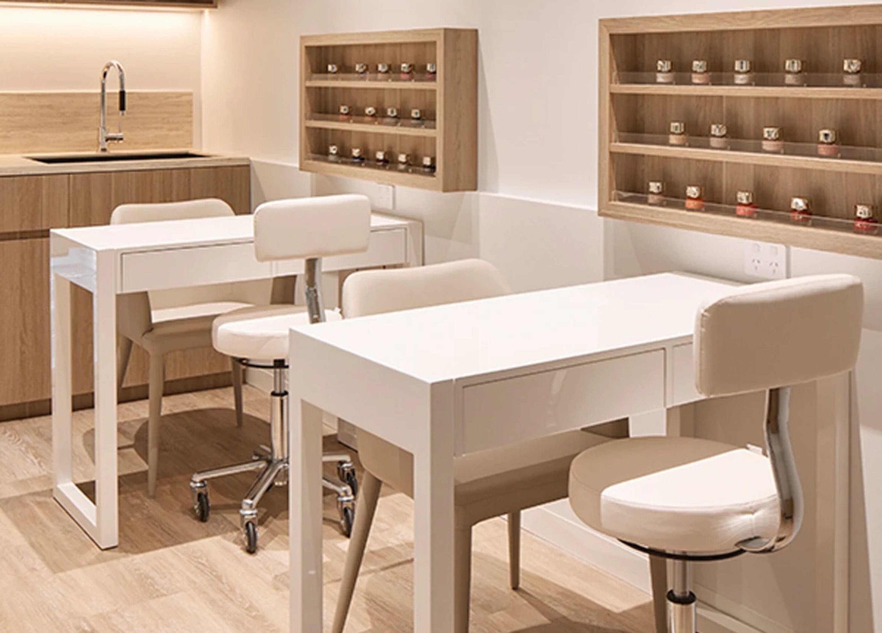 Modern manicure station at Salon Lane, St Leonards, New South Wales, AU, featuring elegant decor and lighting.