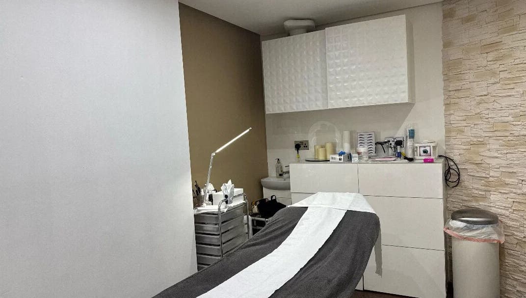 Tranquil treatment room at Nuvia Beauty London, located in London, England, GB featuring modern decor and amenities.