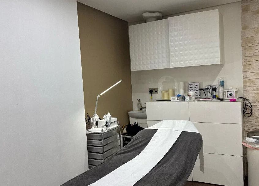 Tranquil treatment room at Nuvia Beauty London, located in London, England, GB featuring modern decor and amenities.