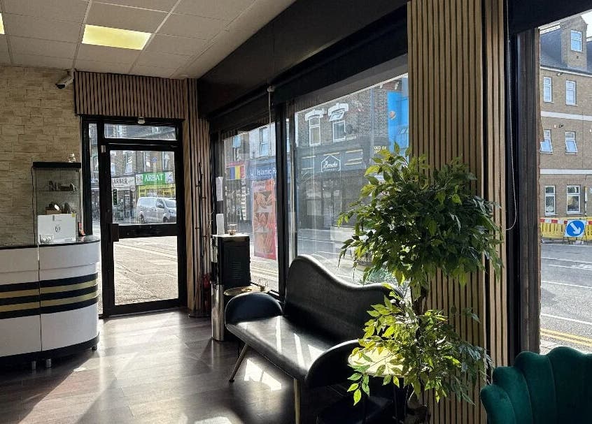 Spacious modern interior of Nuvia Beauty London with large windows in London, England, GB.