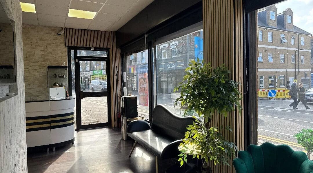 Spacious modern interior of Nuvia Beauty London with large windows in London, England, GB.