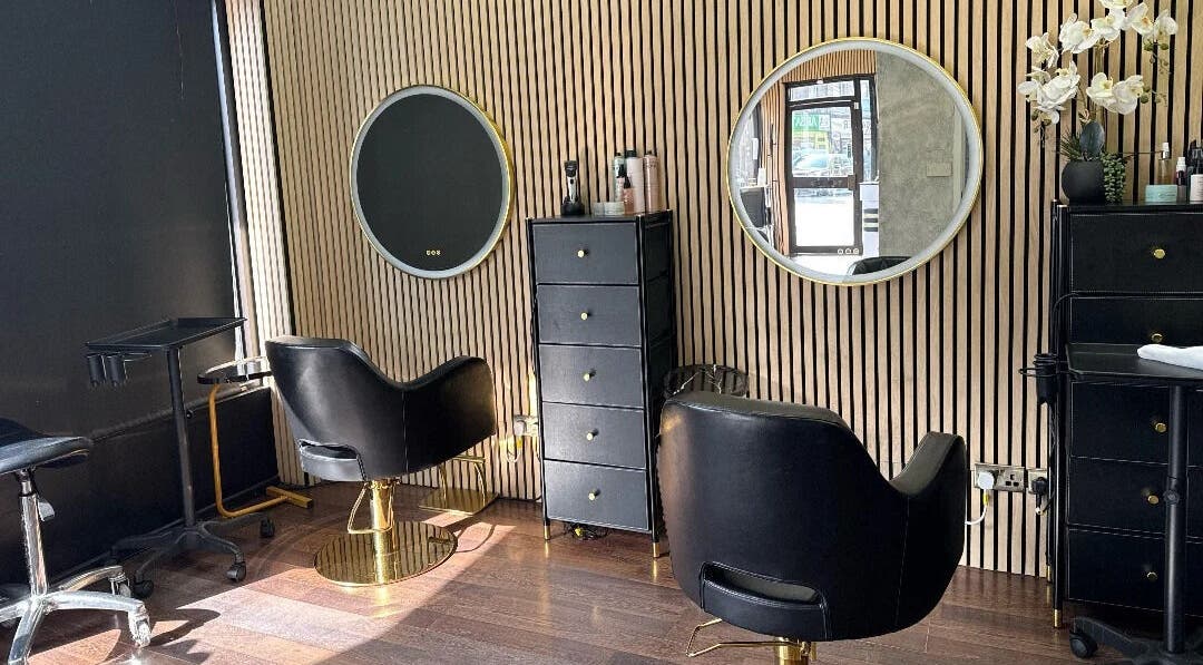 Modern salon chairs and mirrors at Nuvia Beauty London, London, England, GB.