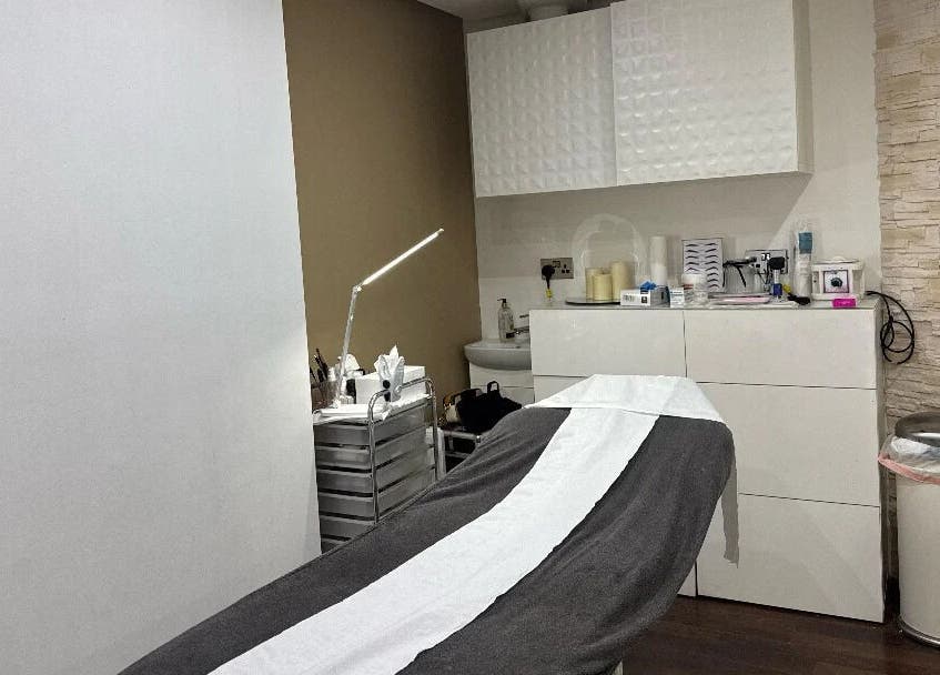 Tranquil treatment room at Nuvia Beauty London, London, England, GB, featuring modern equipment and cozy ambiance.