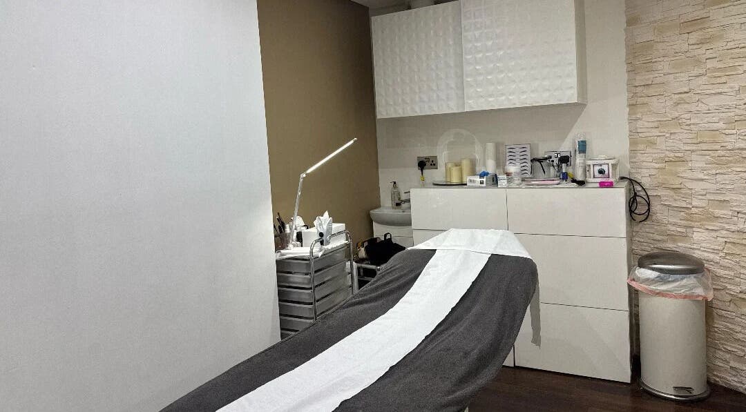 Tranquil treatment room at Nuvia Beauty London, London, England, GB, featuring modern equipment and cozy ambiance.