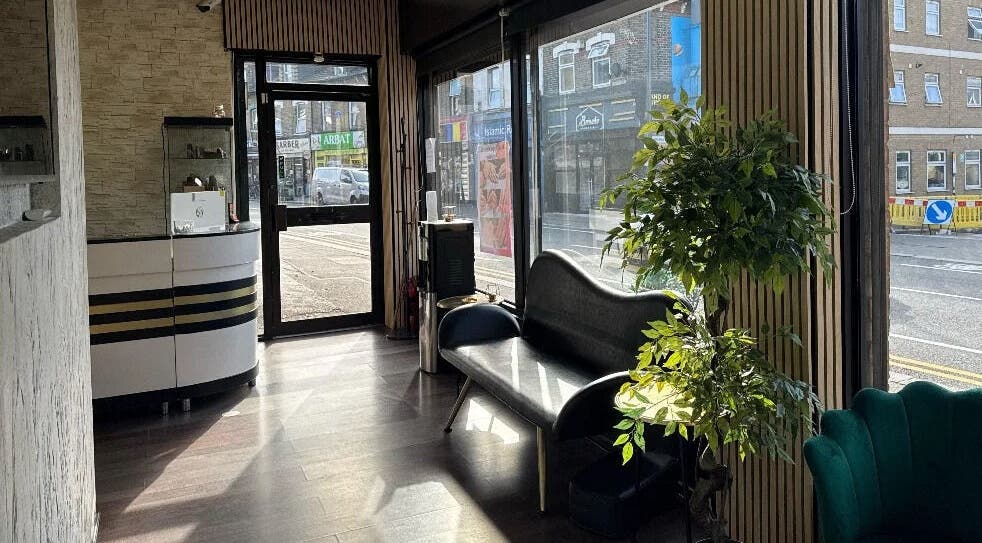 Spacious and bright lounge at Nuvia Beauty London, featuring elegant seating in London, England, GB.