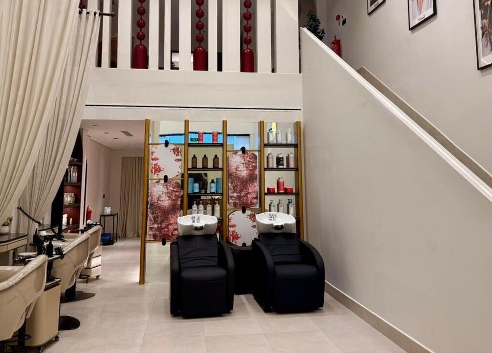 Luxurious interior of Tressy Spa in Riyadh, Riyadh Province, SA, showcasing stylish salon chairs and decor.