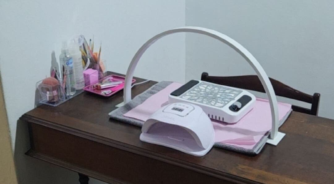 Nail station setup at Pearl's Nest Spa, Amanzimtoti, Kwazulu-natal, ZA, showcasing manicure tools.