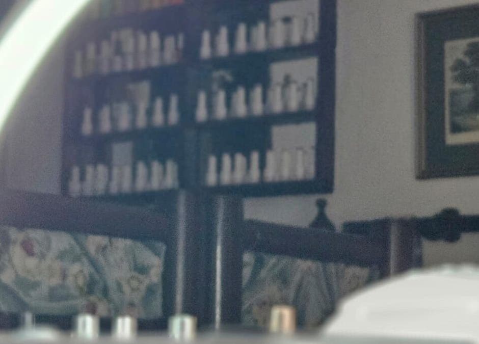 Calming spa ambiance at Pearl's Nest Spa, Amanzimtoti, Kwazulu-natal, ZA with soothing lighting and products.