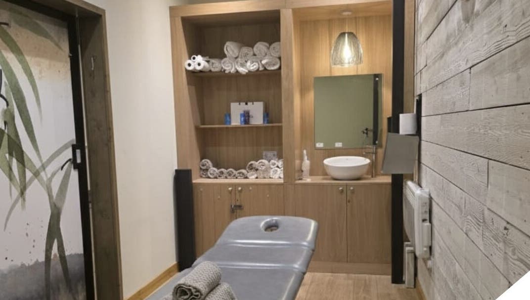 Relaxing therapy room at Kineticflowtherapy, Preston, England, GB with massage table and soothing decor.