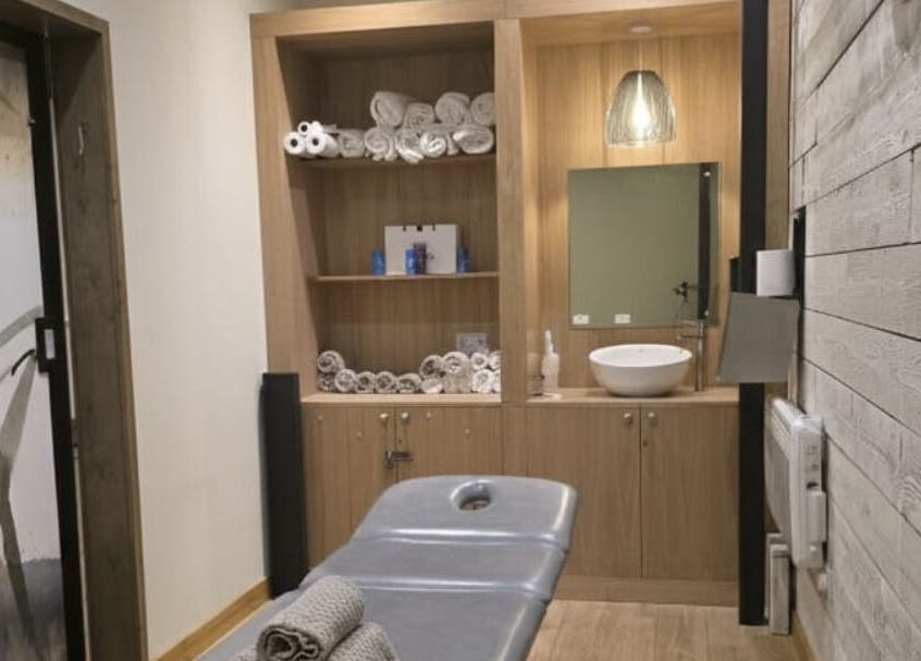 Relaxing therapy room at Kineticflowtherapy, Preston, England, GB with massage table and soothing decor.