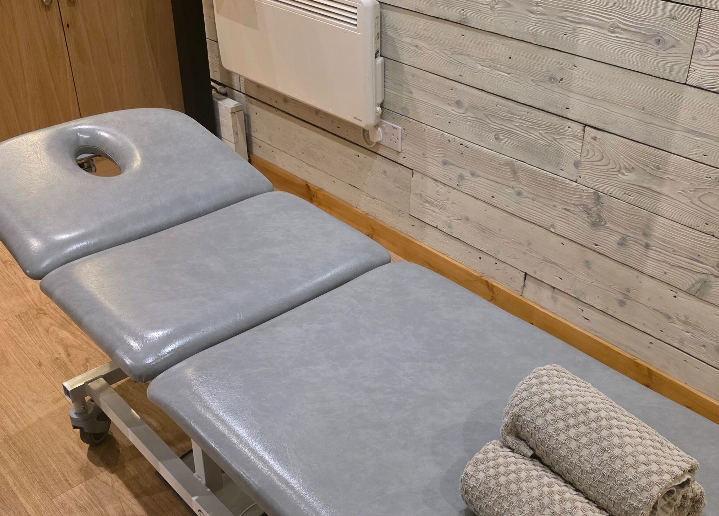 Massage table at Kineticflowtherapy, Preston, England, GB, ready for therapy sessions.