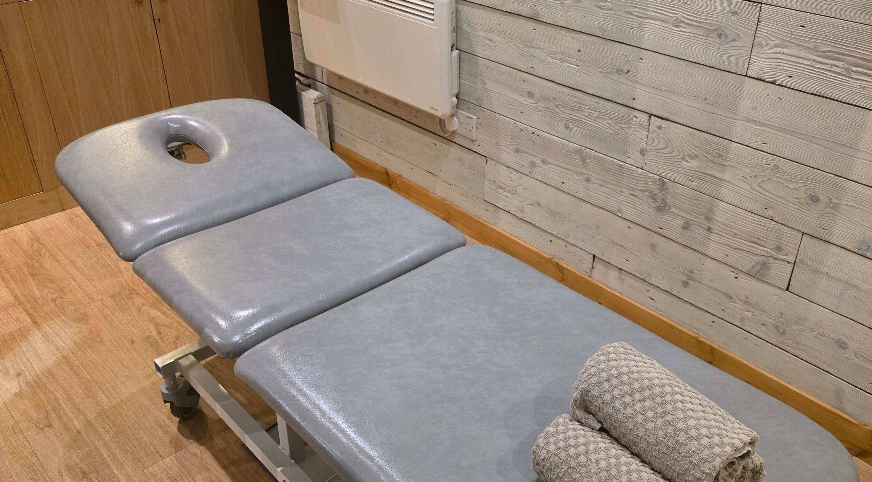 Massage table at Kineticflowtherapy, Preston, England, GB, ready for therapy sessions.