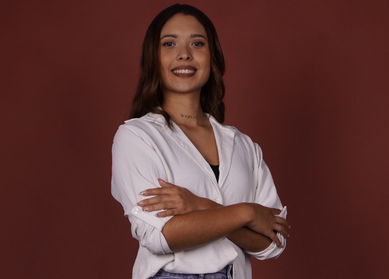 A professional standing confidently at Carol Santos Lash Designer, São João Da Madeira, Aveiro, PT.