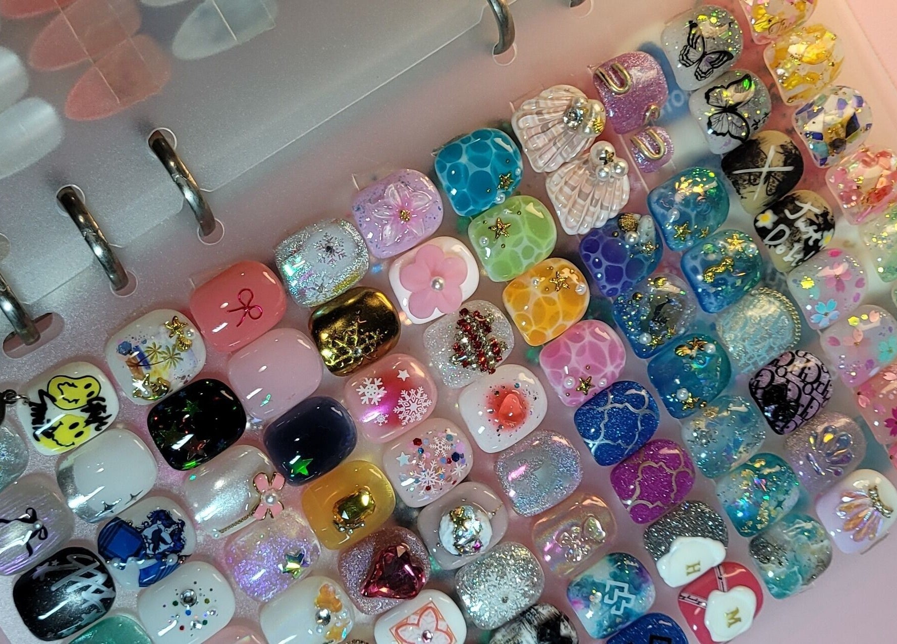 Vibrant nail art designs at Natural Hues, Yeronga, Queensland, AU, showcasing diverse creativity and style.