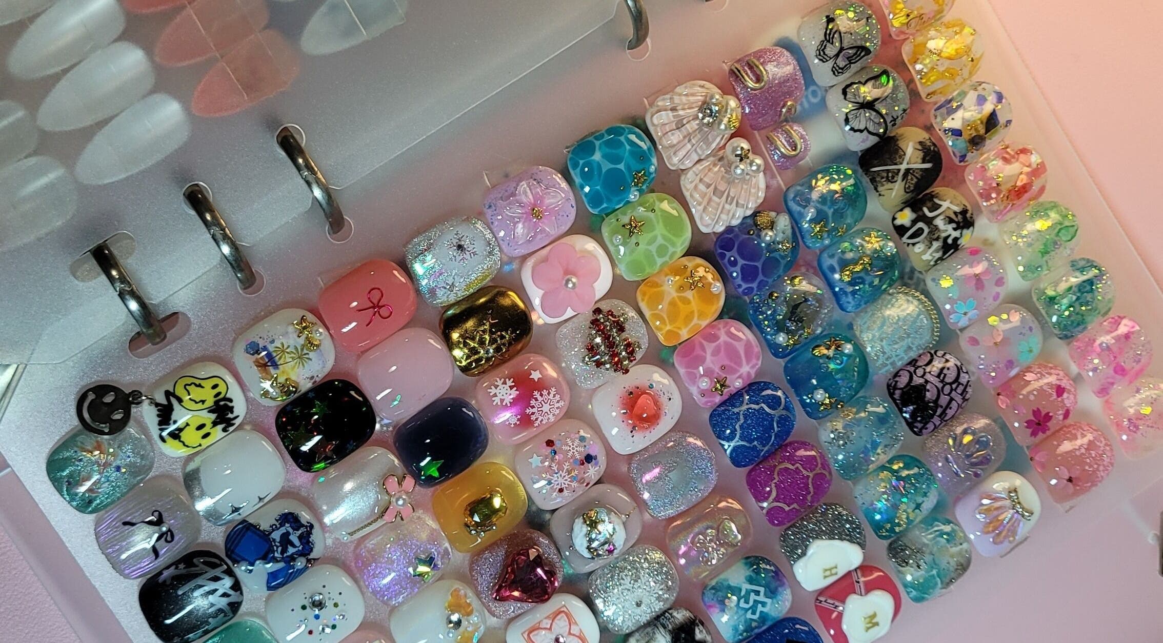Vibrant nail art designs at Natural Hues, Yeronga, Queensland, AU, showcasing diverse creativity and style.