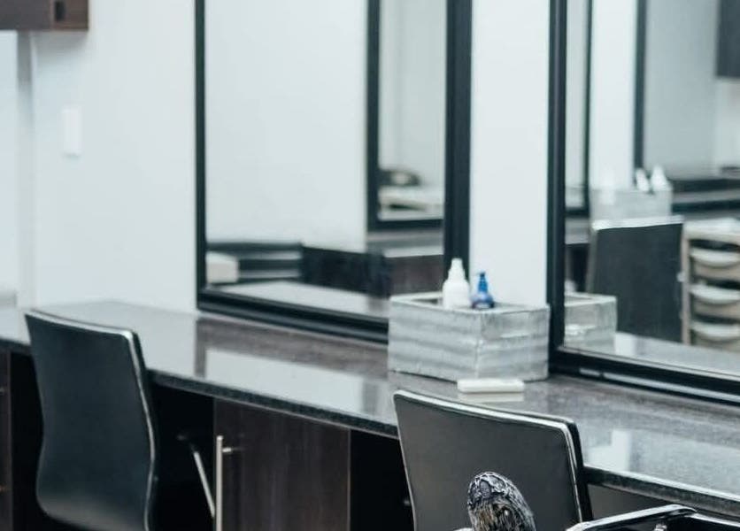 Modern salon chair and mirror setup at Celicia's Hair Studio, Vereeniging, Gauteng, ZA.