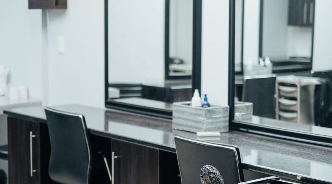 Modern salon chair and mirror setup at Celicia's Hair Studio, Vereeniging, Gauteng, ZA.