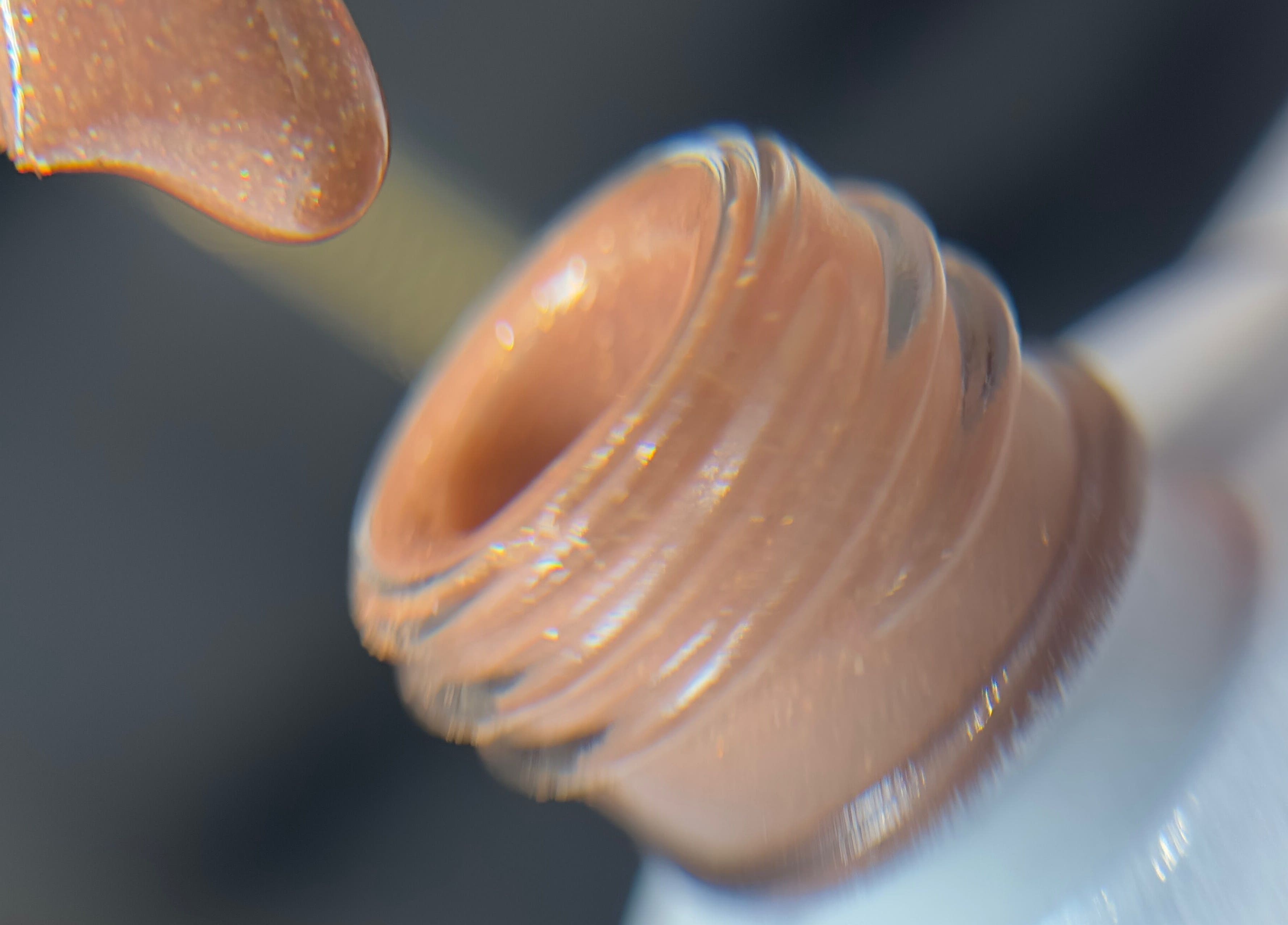 Close-up of brown nail polish at Tailla Rosa- Manicure Brasileira | ENTRECAMPOS, Lisboa, Lisboa, PT.