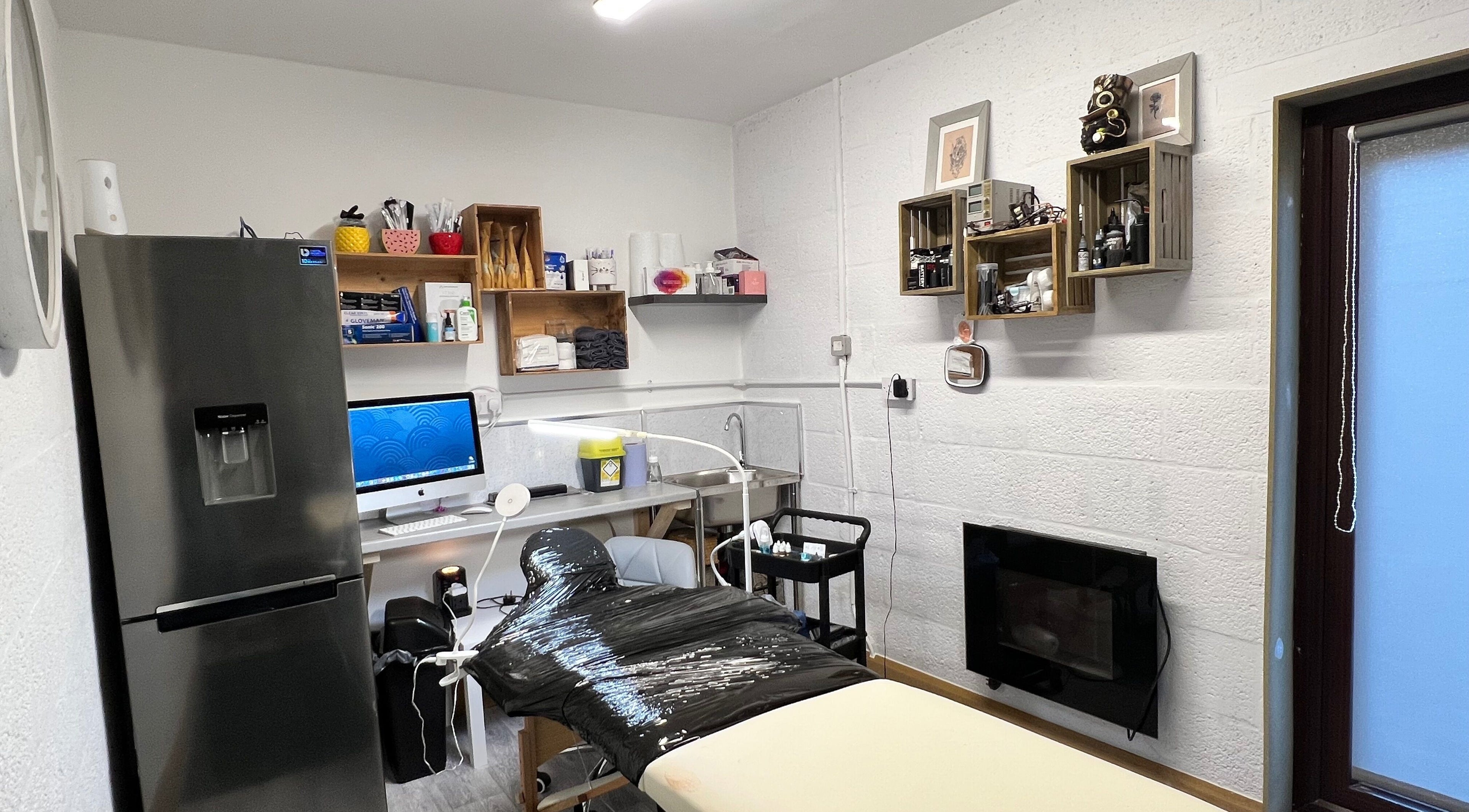 Modern treatment room at The Studio Aesthetic Canvas, Market Drayton, England, GB with sleek decor and equipment.