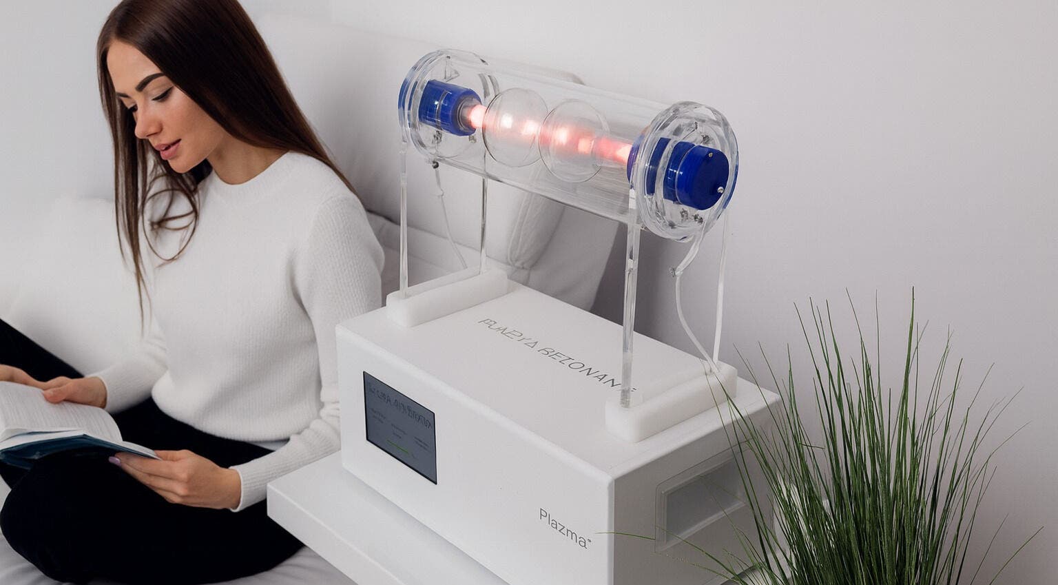 Woman enjoying wellness machine at Briah McCarthy Wellness, Nuneaton, England, GB.