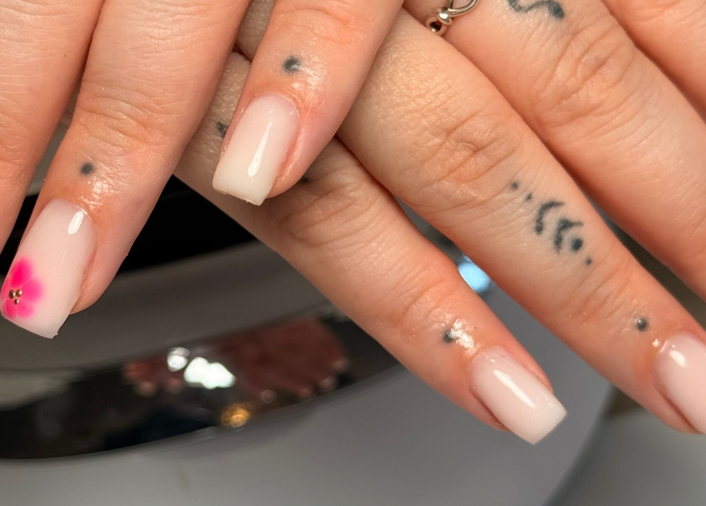 Elegant floral nail art at naileditbyjadee, Barnoldswick, England, GB, showcasing pink flower designs.