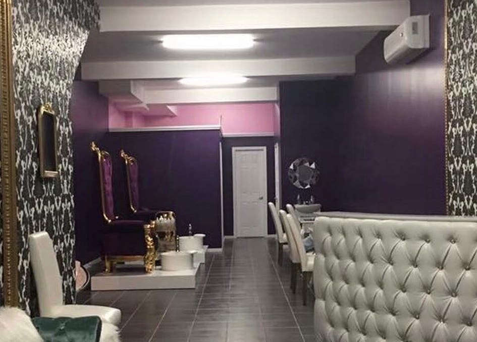 Stylish interior of Lola Lux Atelier in Montréal, Québec, CA, featuring plush seating and elegant decor.