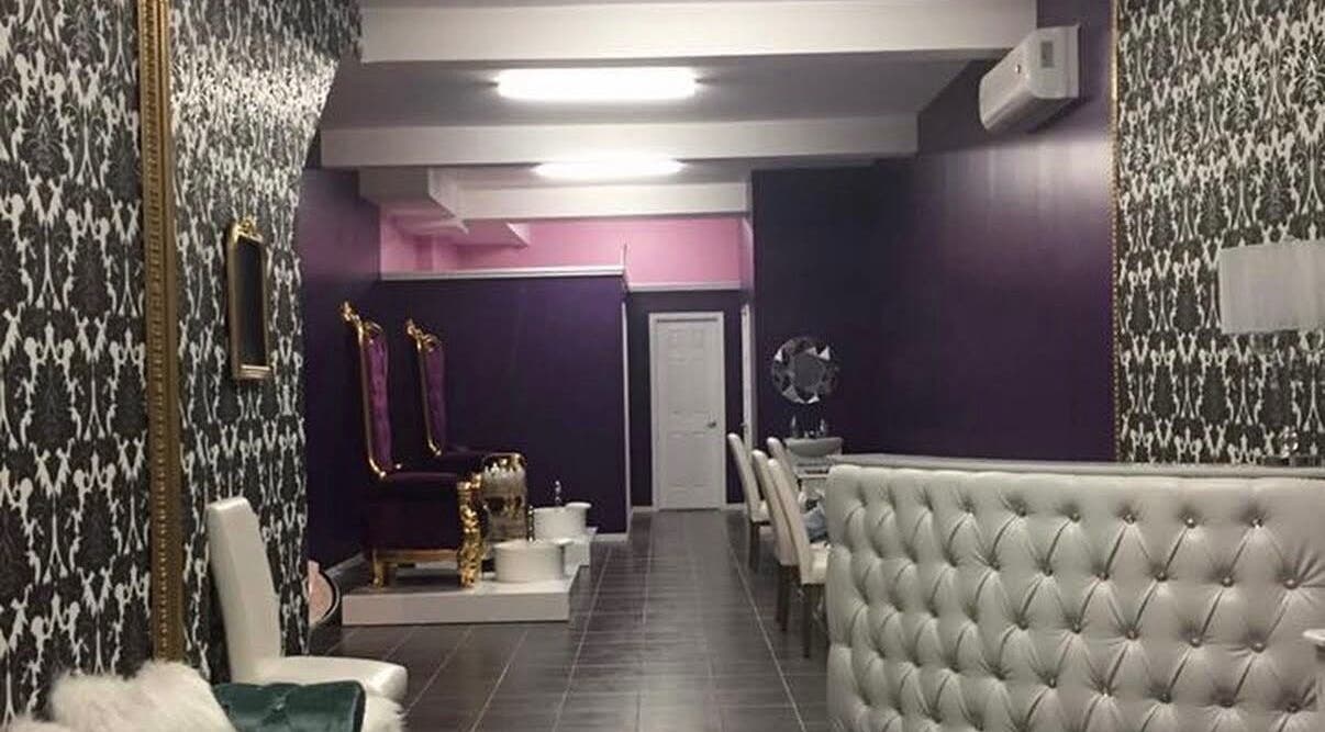 Stylish interior of Lola Lux Atelier in Montréal, Québec, CA, featuring plush seating and elegant decor.