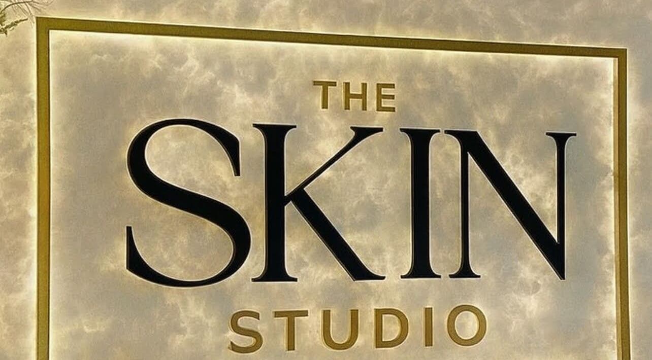 Elegant signage of The Skin Studio JA at Kingston, St. Andrew Parish, JM, showcasing its luxurious branding.