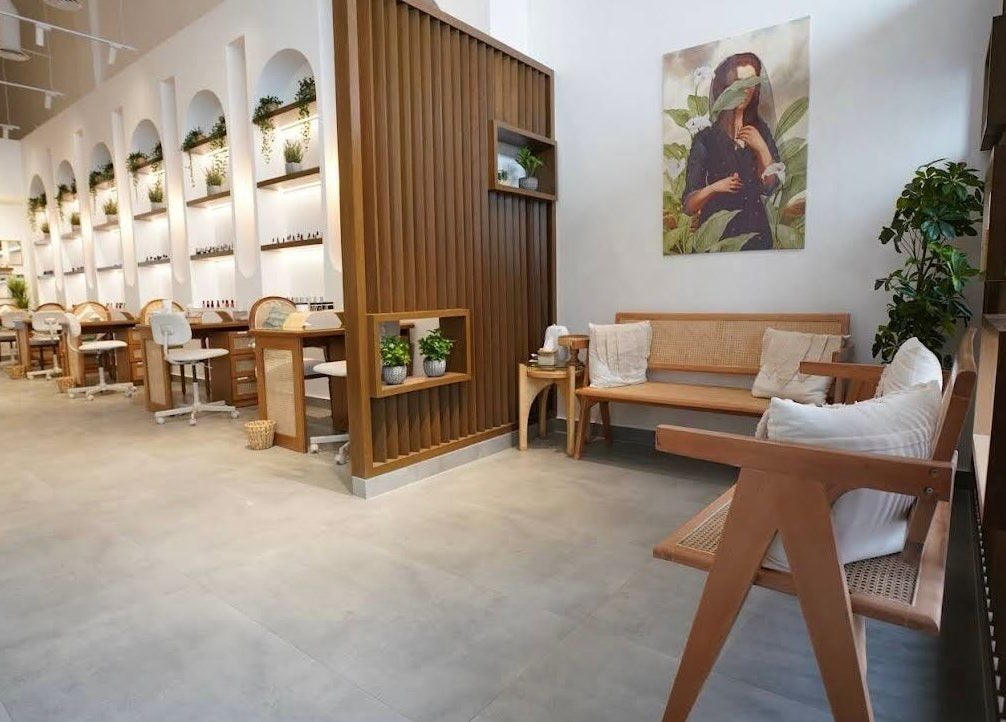 Chic interiors of Nails Glow- Al Ghadeer in Riyadh, Riyadh Province, SA, showcasing elegant nail stations and decor.