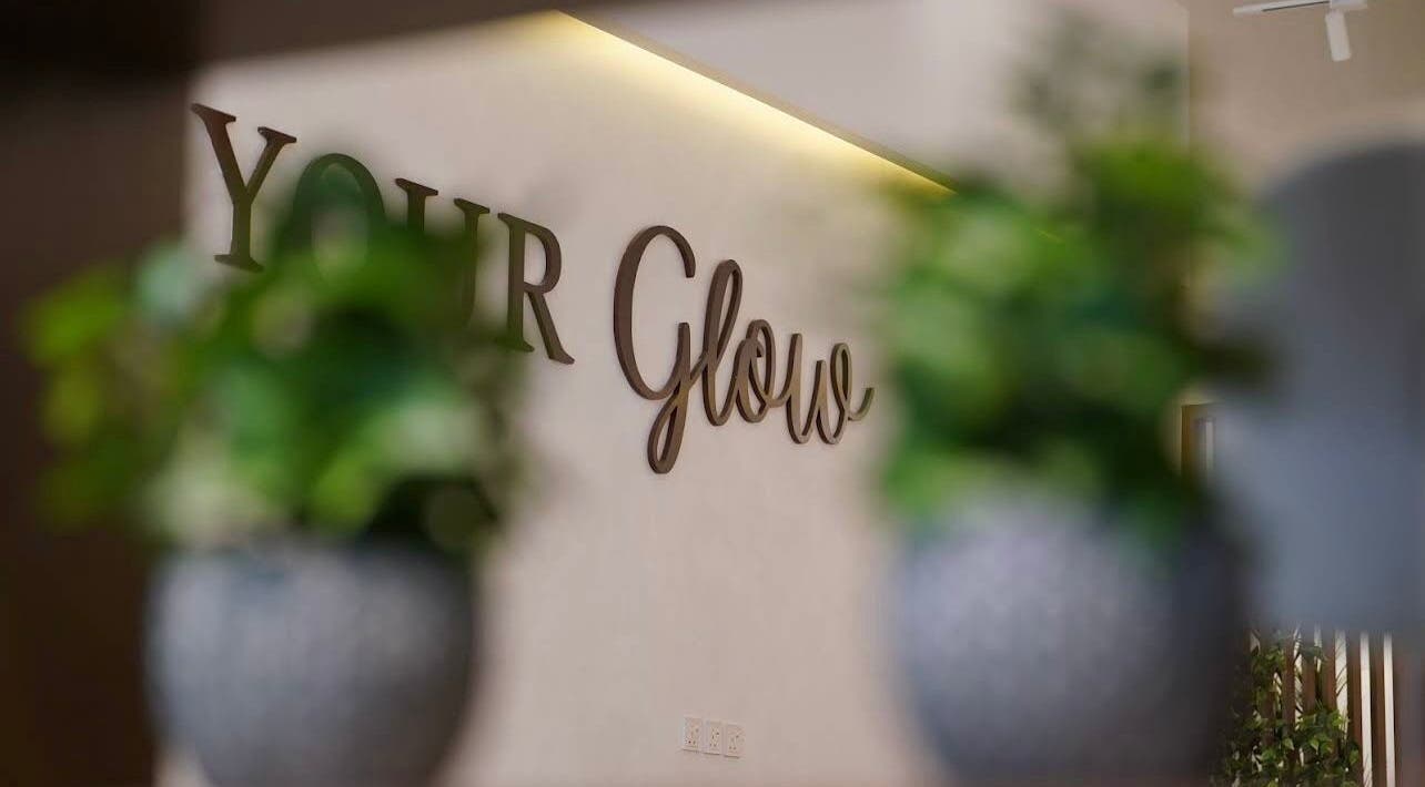 Welcome sign at Nails Glow- Al Ghadeer, Riyadh, Riyadh Province, SA, highlighting ambiance with plants in foreground.